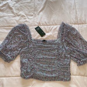 Blue puffy-sleeve shirt